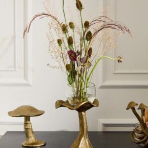 A vase with flowers on top of a table.