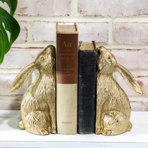 A pair of bookends that look like rabbits.