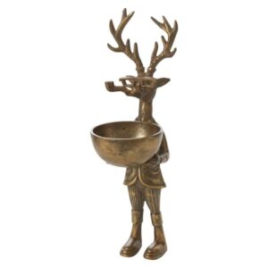 A brass deer holding a bowl in its mouth.