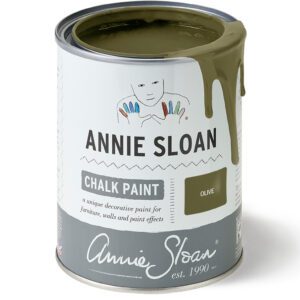 A can of Annie Sloan Chalk Paint in olive green color.
